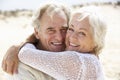 Senior Couple Walking Along Beach Together Royalty Free Stock Photo