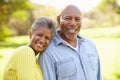 Senior Couple Walking Through Autumn Woodland Royalty Free Stock Photo