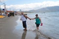 Senior couple walking on beach