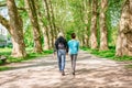 Senior Couple Walking Through A Park, Tuebingen, Germany