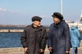 Senior couple walking on a promenade on a winter day