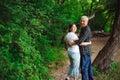 Senior couple walking together in a forest, close-up. Royalty Free Stock Photo