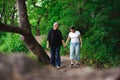 Senior couple walking together in a forest, close-up Royalty Free Stock Photo