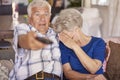 Senior couple watching horror movie Royalty Free Stock Photo