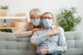 Senior couple wearing facemasks Royalty Free Stock Photo