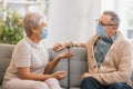 Senior couple wearing facemasks Royalty Free Stock Photo