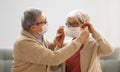 Senior couple wearing facemasks Royalty Free Stock Photo