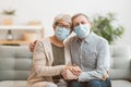 Senior couple wearing facemasks Royalty Free Stock Photo