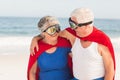 Senior couple wearing superman costume Royalty Free Stock Photo