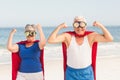 Senior couple wearing superman costume