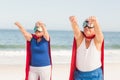 Senior couple wearing superman costume