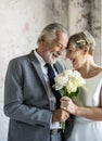 Senior Couple with White Roses Flower Bouquet Royalty Free Stock Photo