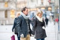 Senior couple window shopping in city centre. Winter Royalty Free Stock Photo