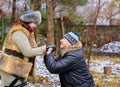 Christmas Holidays, woman and senior man walk at park Royalty Free Stock Photo