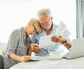 senior couple woman man bill finance tax budget calculator paper document retirement paperwork laptop Royalty Free Stock Photo