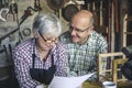 Senior couple in a carpentry