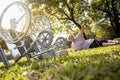 Senior disabled woman falling from her wheelchair after an accident,female patient with a leg pain,asian elderly fell on the grass Royalty Free Stock Photo