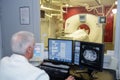 Senior doctor checking computerized axial tomography scan cat scan