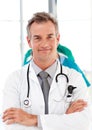 Senior doctor with folded arms Royalty Free Stock Photo