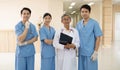 Senior Doctor and Team with nurse and female doctor Surgeon portrait in office at hospital. Royalty Free Stock Photo