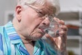 Senior drinking water Royalty Free Stock Photo