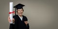 Senior education - mature graduate woman in graduation gown and cap showing diploma. copy space Royalty Free Stock Photo