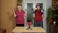 Senior elderly couple grandmother grandfather doing workout with dumbbells, fitness exercising Royalty Free Stock Photo