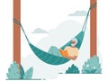 Senior elderly man reading book in hammock Royalty Free Stock Photo