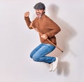 Senior elderly man  wearing beret and glasses smiling happy Royalty Free Stock Photo