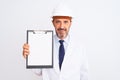 Senior engineer man wearing security helmet holding clipboard over isolated white background with a confident expression on smart Royalty Free Stock Photo