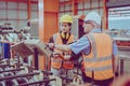 Senior Engineer Training Heavy Industry Worker workman service team working in metal factory Royalty Free Stock Photo