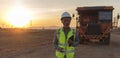 Senior engineer wearing a safety vest and helmet, Royalty Free Stock Photo