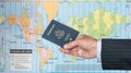 USA Citizen with passport and world map of timezones Royalty Free Stock Photo