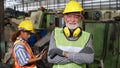 Senior factory worker or engineer close up portrait in factory Royalty Free Stock Photo