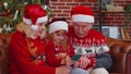 Senior family grandparents, granddaughter purchase online Christmas gifts on mobile phone, shopping