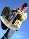 Senior Farmer Digging with Shovel