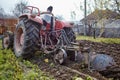 Senior farmer plowing Royalty Free Stock Photo