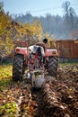 Senior farmer plowing Royalty Free Stock Photo