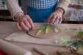 Senior female artisan creating handmade ceramics in pottery studio