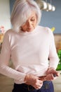 Senior Female Diabetic Injecting Themselves With Insulin Royalty Free Stock Photo