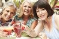 Senior Female Friends Enjoying Cocktails In Bar Together Royalty Free Stock Photo