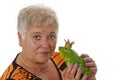 Senior female with a toy frog prince Royalty Free Stock Photo