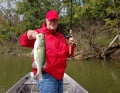 Senior fishing for bass