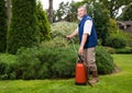 Senior florist working in the garden Royalty Free Stock Photo