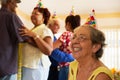 Senior Friends Dancing At Birthday Party In Hospice Royalty Free Stock Photo