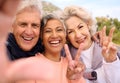 Senior friends, fitness and selfie outdoor with peace sign, portrait and diversity on social media. Happy old man, women