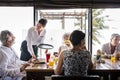 Senior friends having breakfast at a hotel Royalty Free Stock Photo