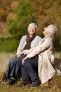 Senior friends, laughing or conversation in nature for travel, together or bonding on retirement in outdoor. Elderly Royalty Free Stock Photo