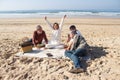 Senior friends playing dominoes outdoors Royalty Free Stock Photo