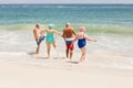 Senior friends playing in water Royalty Free Stock Photo